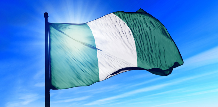 Nigeria flag waving on the wind at daytime clear skies