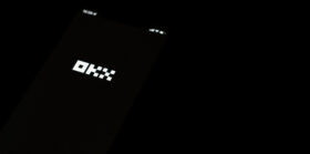 OKX logo on smartphone screen