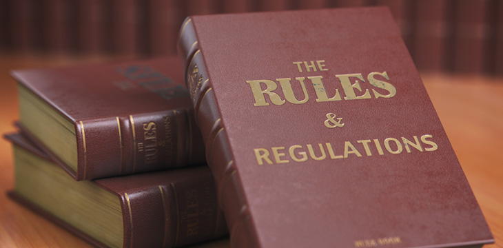 Rules an regulations books with official instructions and directions of organization or team.