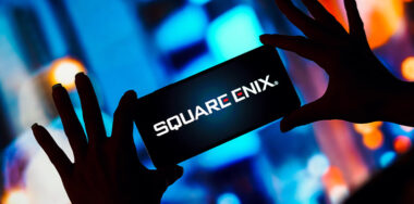 Square Enix Holdings logo is displayed on a smartphone screen