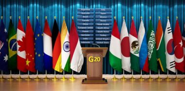 G20 country flags arranged in a conference room