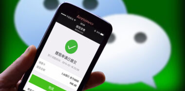 A Chinese mobile phone user uses WeChat