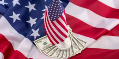 Flaglet on US dollar bills on the flag of the United States of America