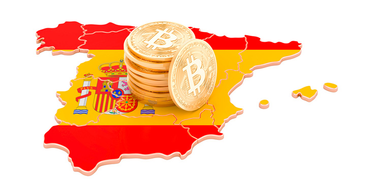 Stack of gold bitcoins on top of Spain map