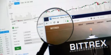 Bittrex cryptocurrency exchange website under magnifying glass