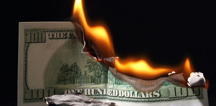100 dollar bill burning