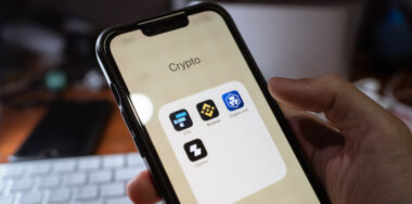 iPhone 13 showing its screen with FTX, Binance, Crypto.com, Zipmex, popular cryptocurrency trading applications.