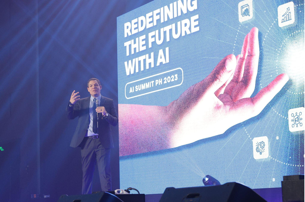 ACTION FOR A COLLECTIVE PURPOSE. ADI CEO Dr. David R. Hardoon inspires the crowd with a call to action for AI-driven business transformation and sustainable growth, marking the end of a successful event.