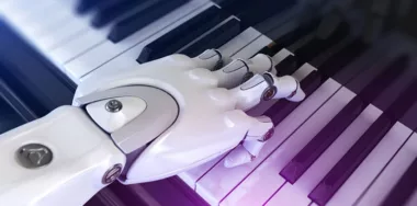 Artificial Intelligence concept - humanoid robot hand playing the piano