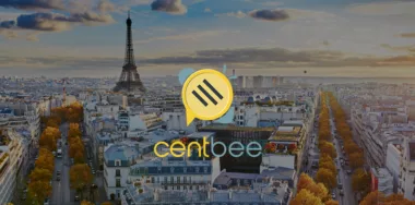 Centbee logo with aerial panoramic cityscape view of Paris, France