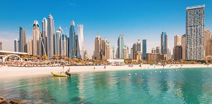 White beach and Dubai skyline