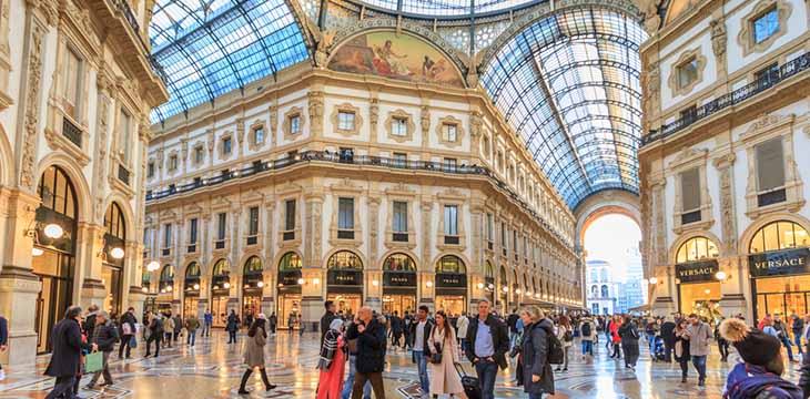 People Walking In Gallery Vittorio Emanuele II, the shopping mall in Milan