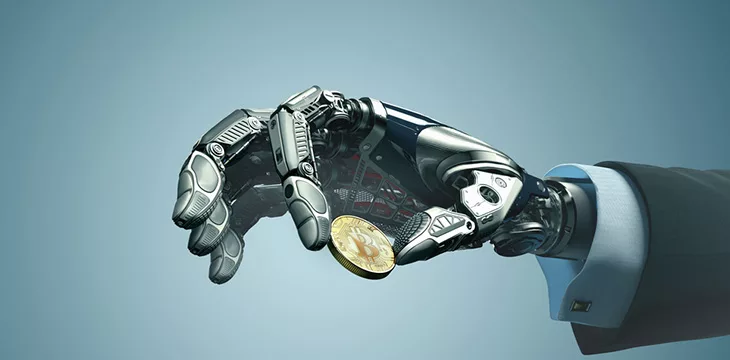 robotic hand wearing suit holding gold bitcoin