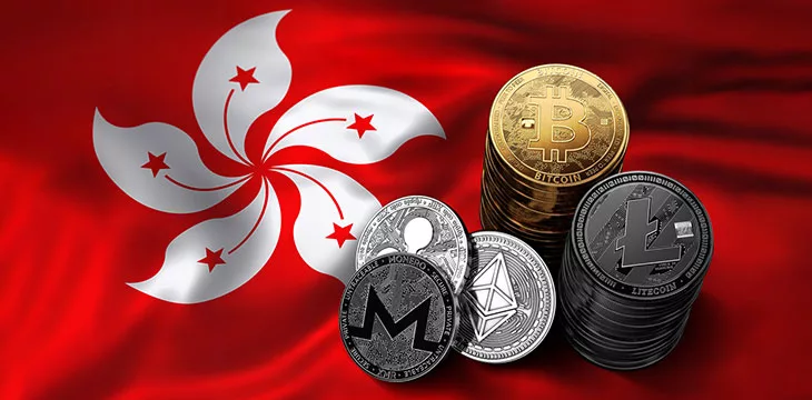 Situation of Bitcoin and other cryptocurrencies in Hong Kong concept. Stack of Bitcoin coins on Hong Kong flag.