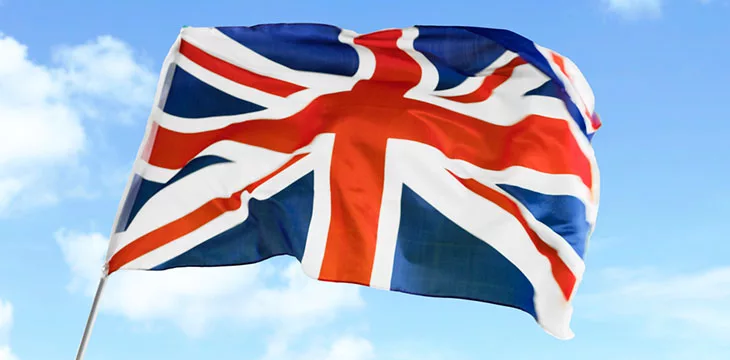 United Kingdom flag with blue sky background