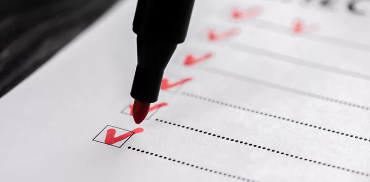 checklist with red check marks