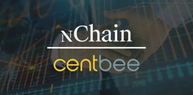 nChain and Centbee strategic partnership with men handshaking background