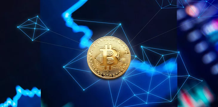 Bitcoin Cryptocurrency with digital blue background