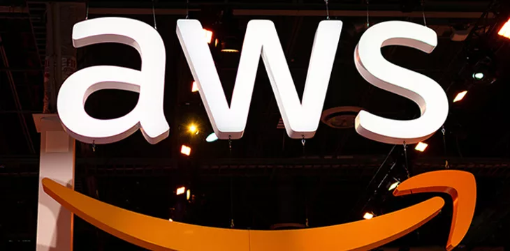 Large AWS sign. Amazon Web Services (AWS) is a subsidiary of Amazon that provides on-demand cloud computing platforms for its customers