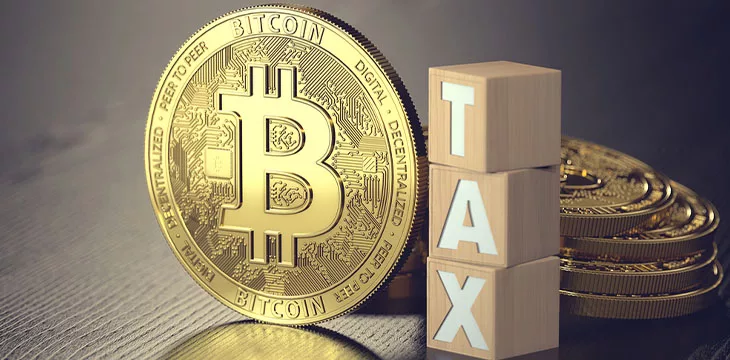 gold bitcoins and TAX letter blocks