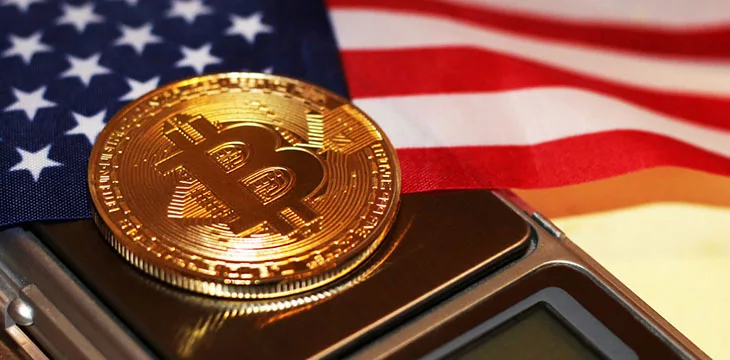 Bitcoin and the electronic scales with American flag