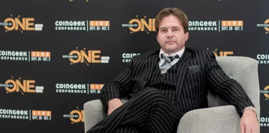 Dr. Craig S. Wright with CoinGeek Conference photo-op in the background