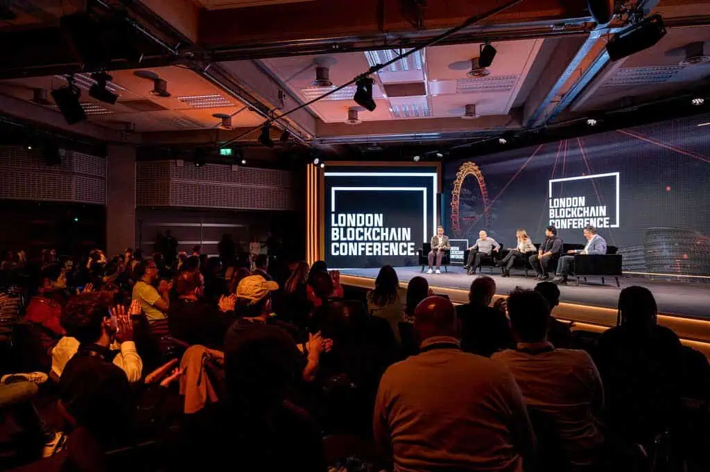 Panellists at the London Blockchain Conference overlooking the audience