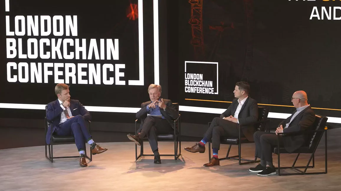 Panelists group photo on the London Blockchain Conference stage