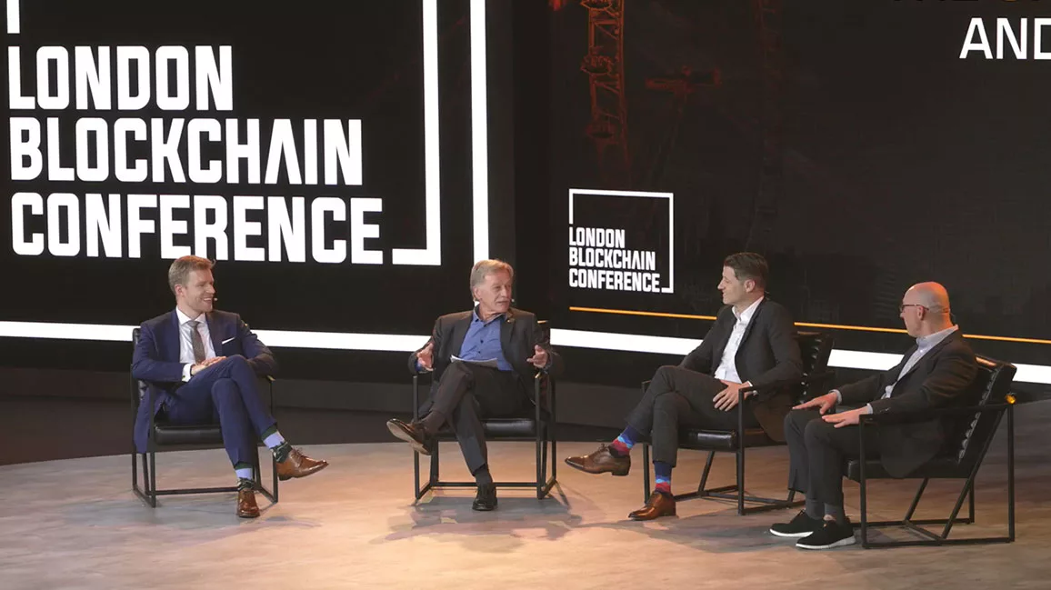 Panelists group photo on the London Blockchain Conference stage