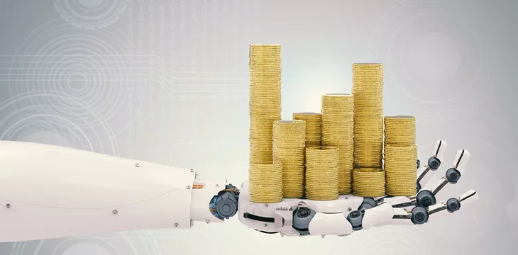 Robotic hand with gold coins