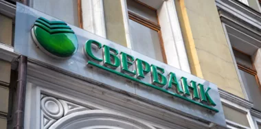 The logo of Russian's largest state savings bank Sberbank on the facade of the building.