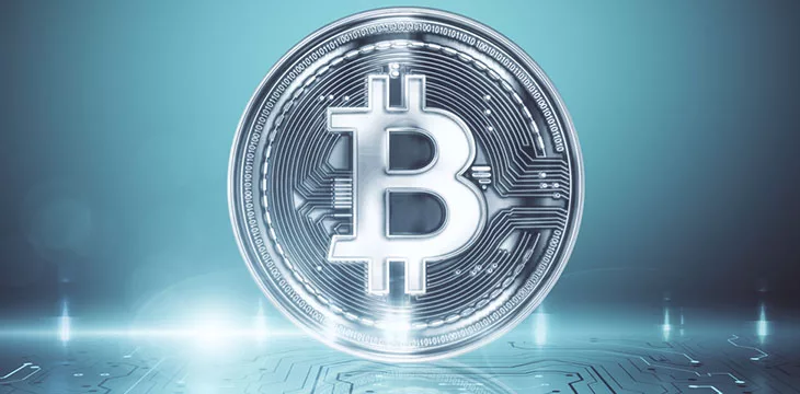 Creative glowing shiny silver bitcoin background