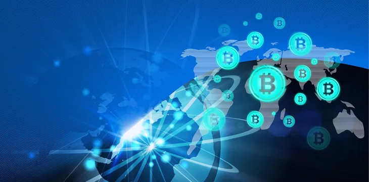 Composition of bitcoin symbols over connections and globe on blue background