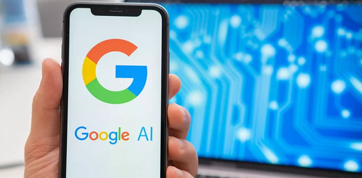 Google AI artificial intelligence logo on the screen of mobile phone and neural network on the screen of laptop on the background