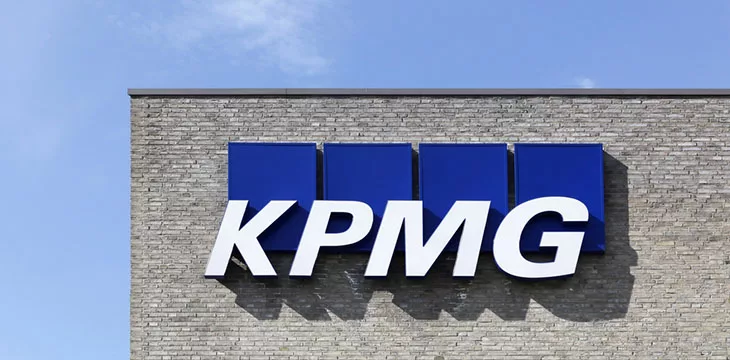 KPMG logo on a wall