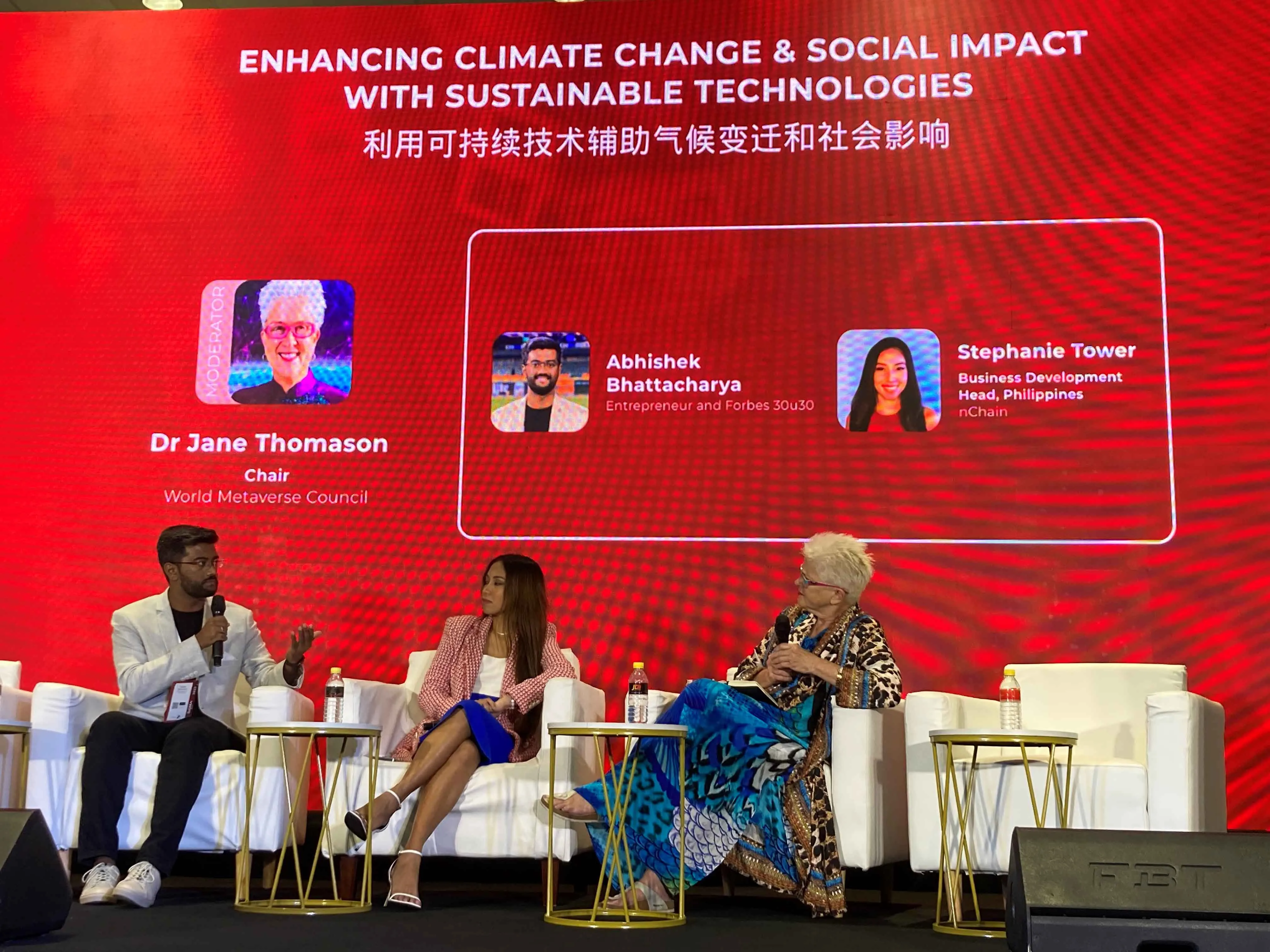 Abhishek Bhattacharya, Stephanie Tower, and Dr. Jane Thomason on stage at the AIBC Asia Summit