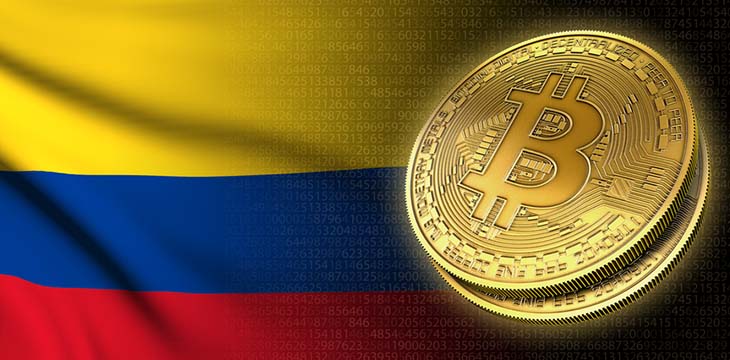 gold bitcoin with the flag of Colombia