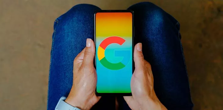 Google logo is displayed on a smartphone mobile