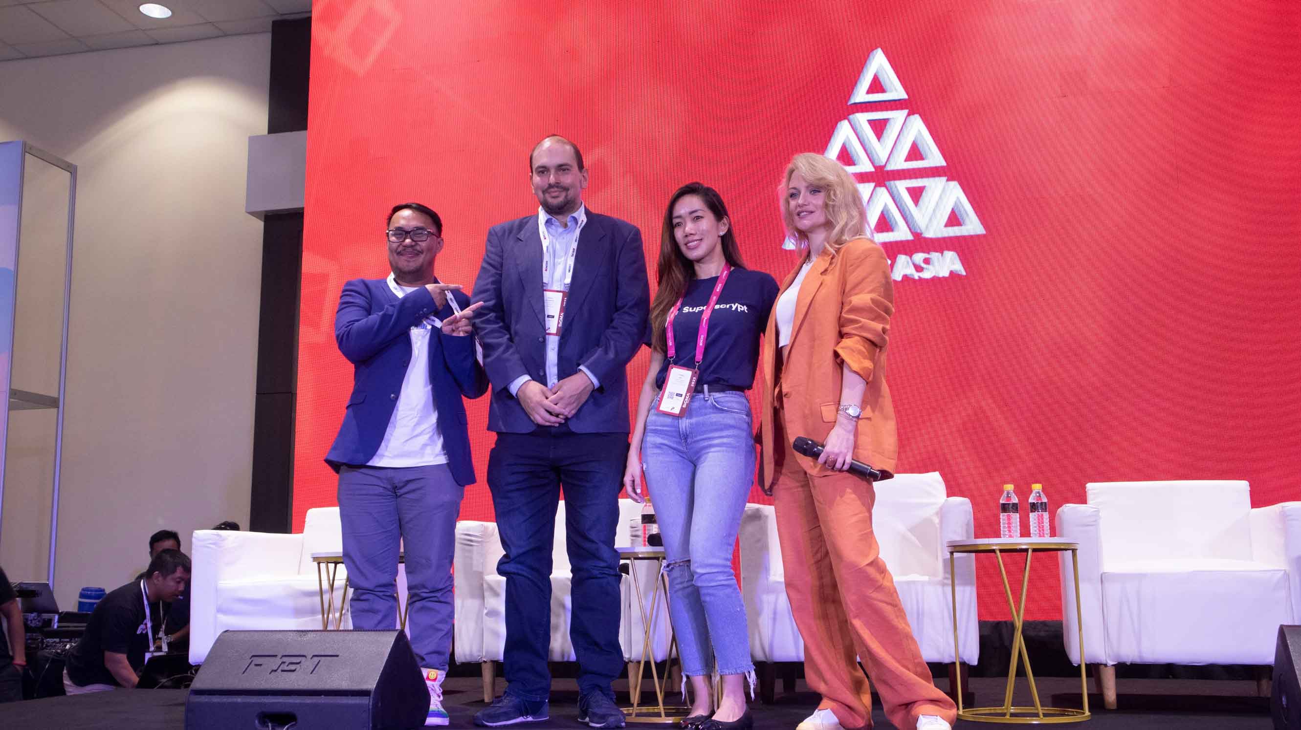 Kenneth James Berry, Frank Schuengel, Yvonne Ang, and Olga Yaroshevsky at the AIBC Asia Summit on stage