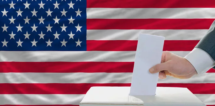 Man voting on elections in USA in front of flag