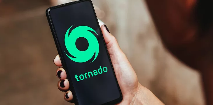 Tornado Cash logo on a mobile phone