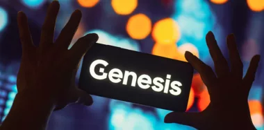 Logo of Genesis on a smartphone screen