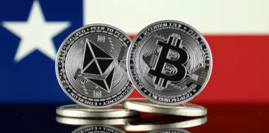 Physical version of Ethereum (ETH), Bitcoin (BTC) and Texas State Flag