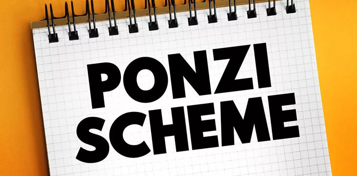 Ponzi Scheme on a notepad