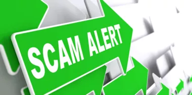 Scam alert in green arrow