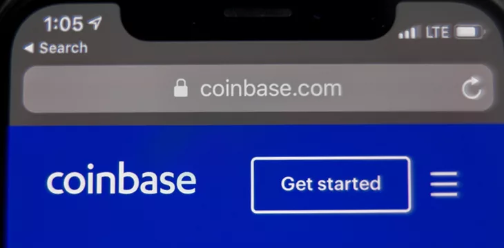 Coinbase cryptocurrency trading platform mobile application running on smartphone