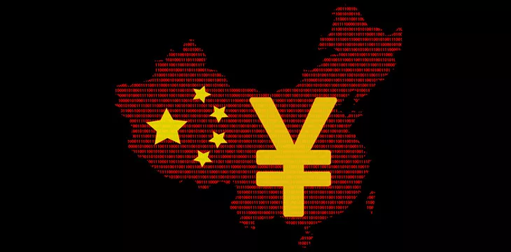 Silhouette of a China map made of binary code with the symbol of the Chinese digital yen, on a black background