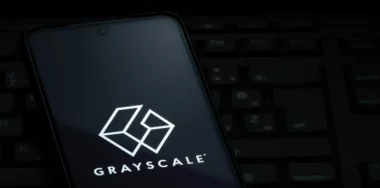 Grayscale investing logo shown on smartphone screen