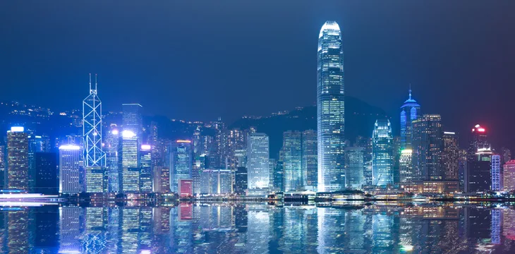 Hong Kong Victoria Harbor skyline and cityscape at night