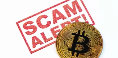 Scam Alert stamp with a gold bitcoin